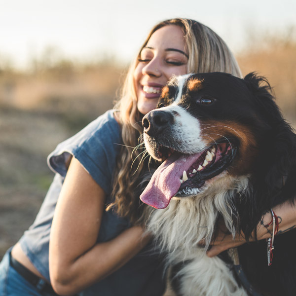 woman outside with her dog